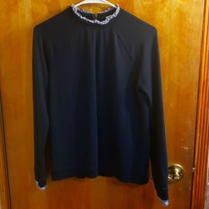 Shirt with decorative sleeves and collar